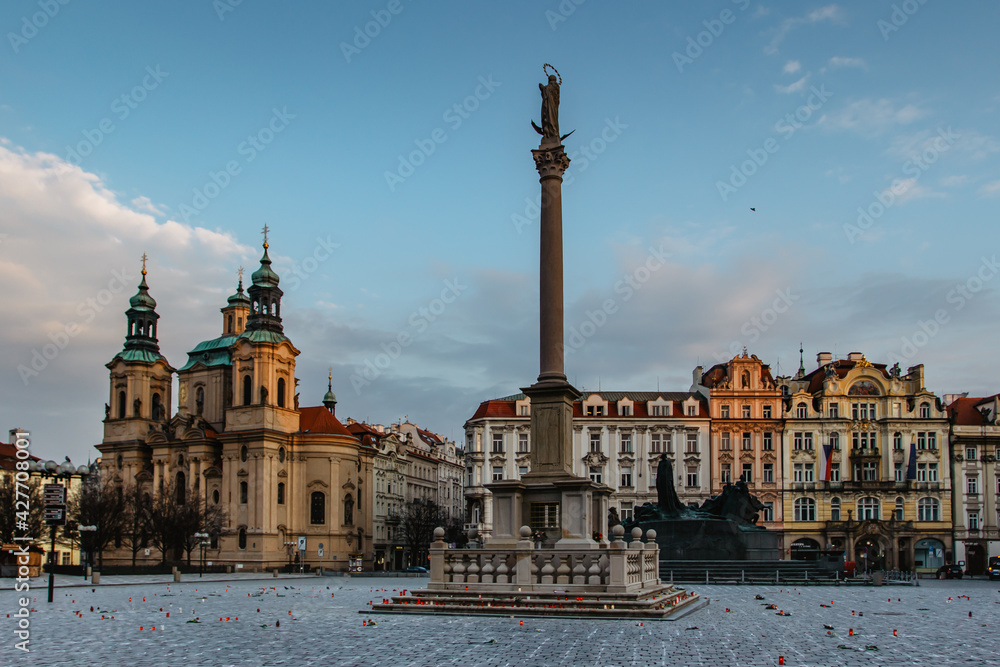 Fototapeta premium 25 000 crosses on Old Town Square as memory of COVID-19 virus victims.Life in pandemic.Empty city during lockdown.Historical, gothic style buildings at sunrise.Famous place unesco heritage square.