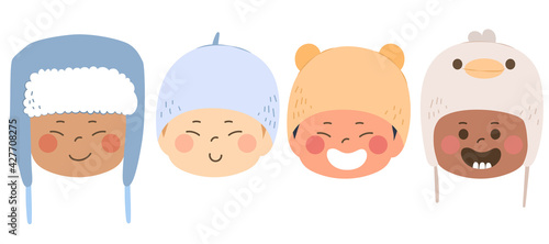 Four babies of different races wearing cute wool winter hats