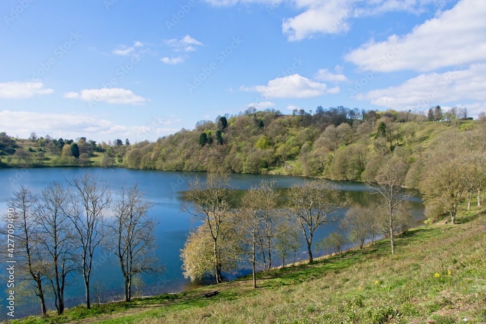 Lake (Weinfelder maar) in the Volcanic Eifel or Vulkan Eifel mountains in Germany Lake (Weinfelder maar) in the Volcanic Eifel or Vulkan Eifel mountains in Germany