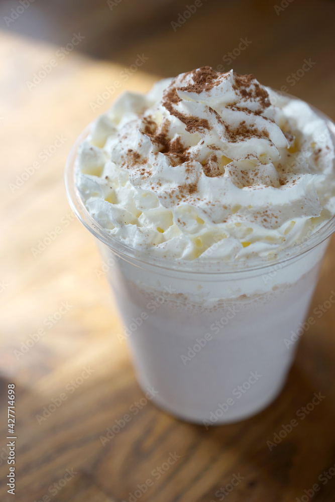 Chocolate milkshake sprinkled with cocoa Chocolate milkshake sprinkled with cocoa