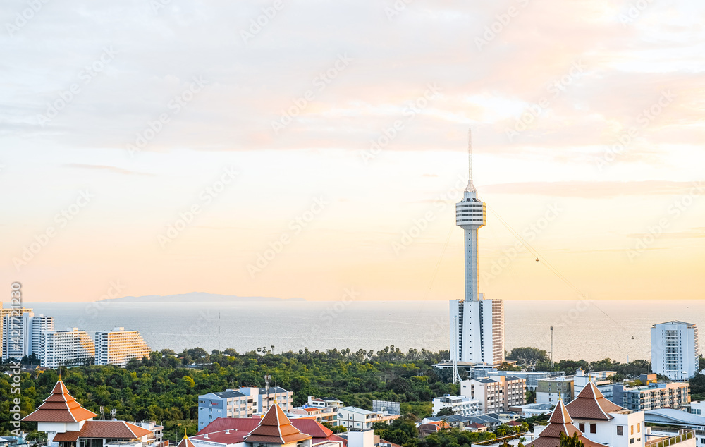 Obraz premium Pattaya Park Tower against the sunset sky