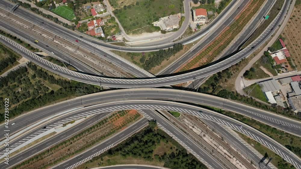 Aerial drone video of multilevel highway junction toll road of Attiki Odos connecting Attica to Athens International Airport of Eleftherios Venizelos, Attica, Greece Aerial drone video of multilevel highway junction toll road of Attiki Odos connecting Attica to Athens International Airport of Eleftherios Venizelos, Attica, Greece