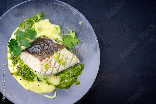 Canvas Print Modern style traditional fried skrei cod fish filet with mashed potato cream and