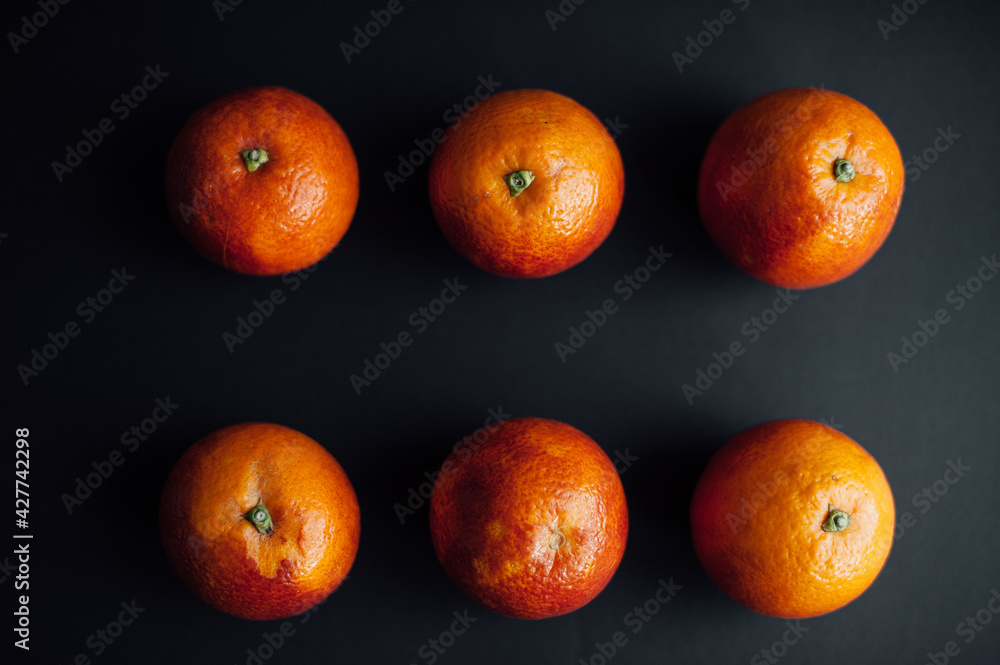 sicilian orange cut into pieces.
citrus, vitamins, on a dark background. wooden board. Healthy Eating.
food for rest. vegetarianism sicilian orange cut into pieces.
citrus, vitamins, on a dark background. wooden board. Healthy Eating.
food for rest. vegetarianism