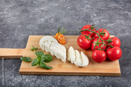 Cheese braided braid. Fresh soft white buffalo buffalo milk mozzarella cheese braid Turkish pasta filata method, Istanbul, Turkey. photo