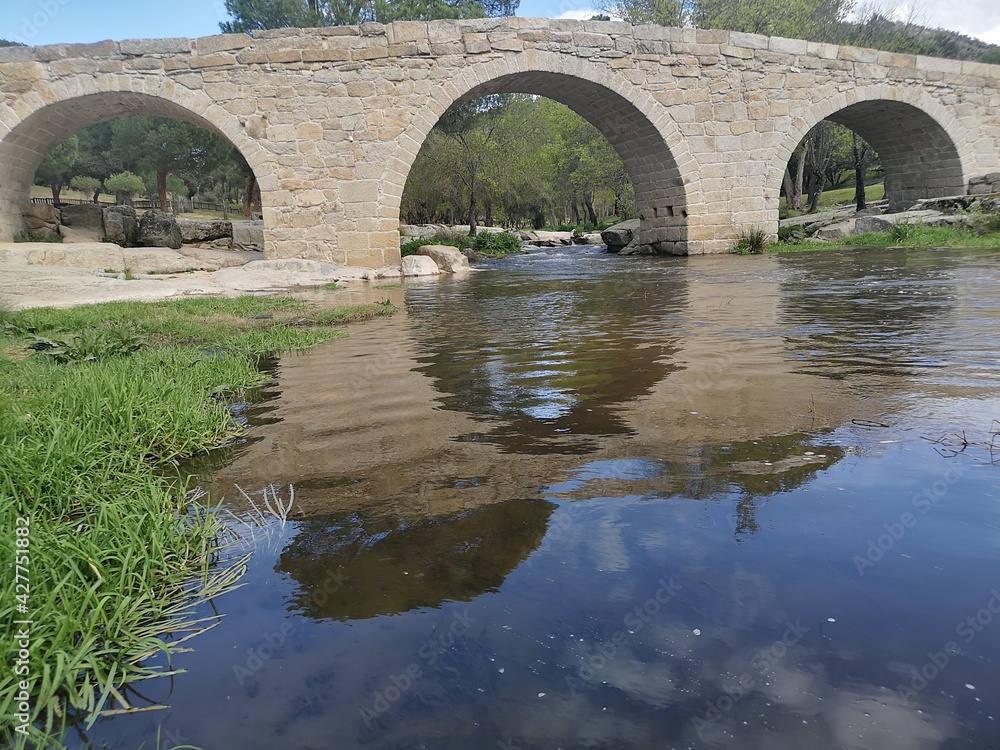 Fototapeta premium Old medieval bridge over the river