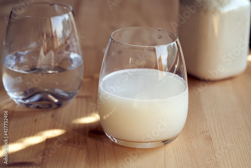 A glass of drink made from whey protein powder