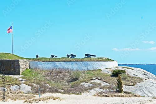 Vintage canon are mounted at Fort Phoenix guarding the entrance to the harbor in Fairhaven, Massachusetts. photo