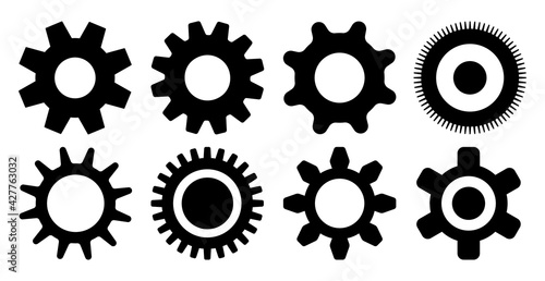 Black gears vector set on white background. Cogwheels collection, technology concept illustration with machinery elements.  