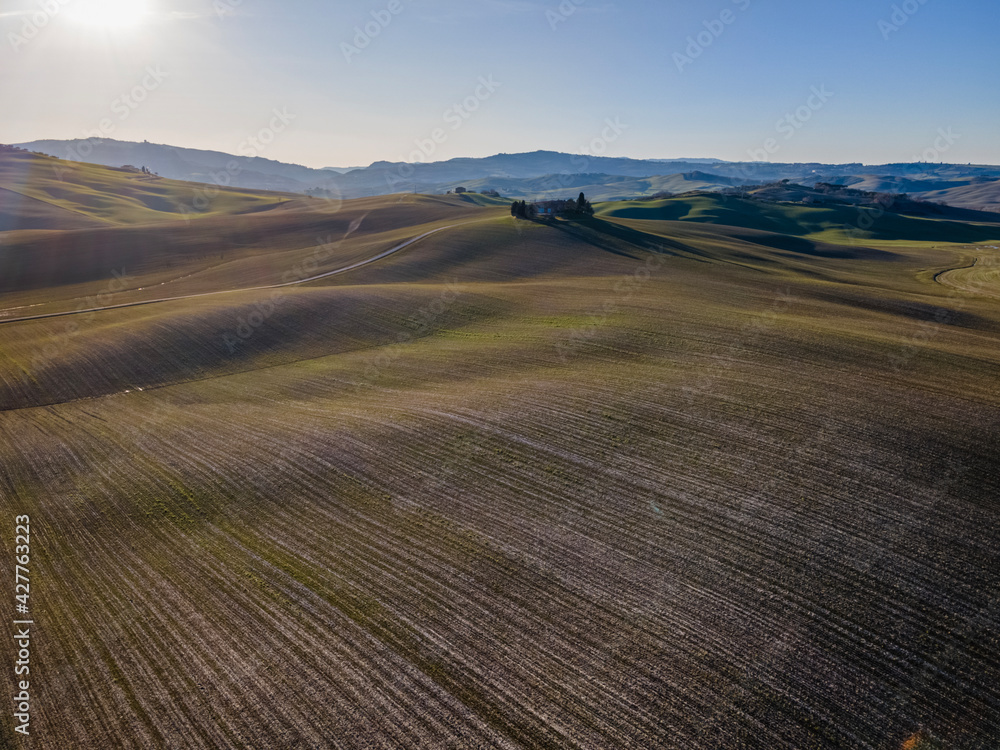 Scenic view of an idyllic countryside with rolling hills.  Aerial view, drone shot.