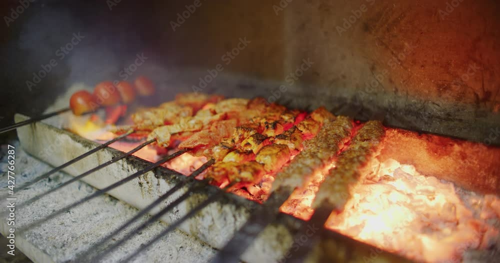 Slow Motion 60 fps Shot of Meat Barbecuing at Iskan Street in Erbil, Iraq Slow Motion 60 fps Shot of Meat Barbecuing at Iskan Street in Erbil, Iraq