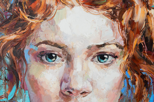 Fragment of art painting. Portrait of a girl with red hair is made in a classic style. .A woman's face with blue eyes.