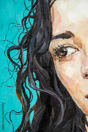 Fototapeta Naklejka Na Ścianę i Meble -  Fragment of work where fiery black curly hair as a waterfall falls from the head of a white-faced girl. .Portrait of a Hispanic woman on a blue background. Oil painting on canvas.