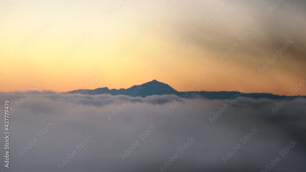 Clouds Covered Mountain Peak With Sunset Sky In Background. - Aerial Shot Clouds Covered Mountain Peak With Sunset Sky In Background. - Aerial Shot