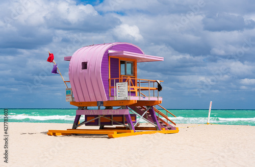 Iconic colorful life guard tower at sunny South Beach, Miami-Dade, Florida USA
