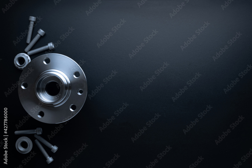 Car construct. Set of new metal car part. Auto motor mechanic spare or automotive piece isolated on black background. Automobile engine service with space for text. Car construct. Set of new metal car part. Auto motor mechanic spare or automotive piece isolated on black background. Automobile engine service with space for text.
