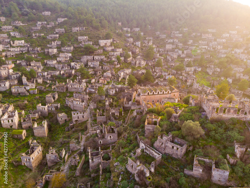 Aerial view of ancient Greek ruined Kayakoy village, preserved as museum village and ghost settlement in Mugla Province of Turkey