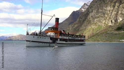 Queenstown, New Zealand - August 2019. The TSS Earnslaw is a 1912 Edwardian vintage twin screw steamer plying the waters of Lake Wakatipu in New Zealand.  