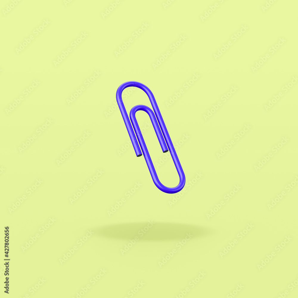 One Blue Paperclip on Green Background One Blue Paperclip on Green Background