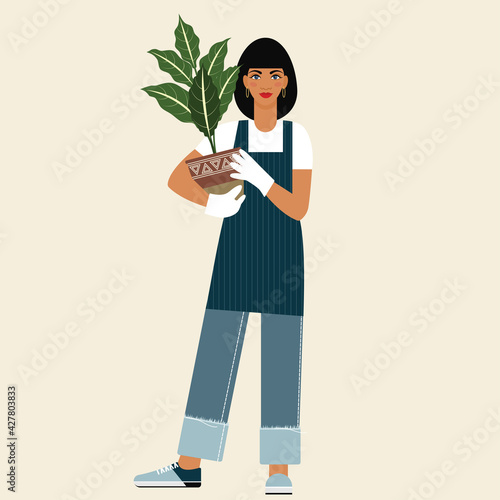 girl in jeans with a flower