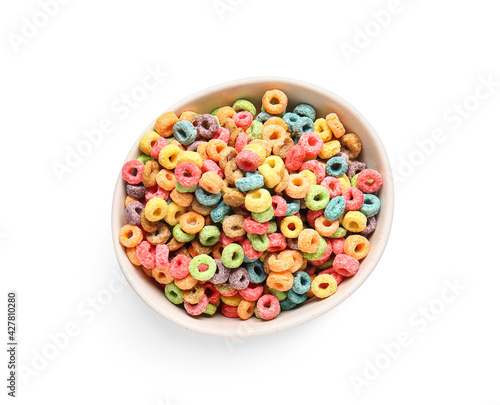Bowl with tasty cereal rings on white background