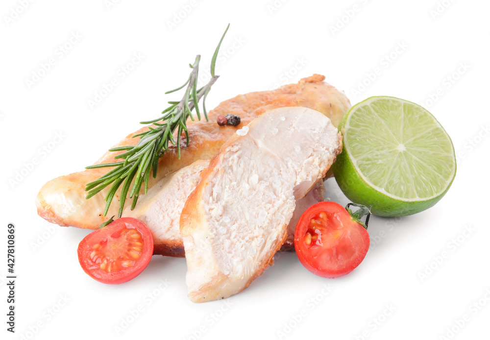 Roasted chicken fillet with tomato, lime and rosemary on white background Roasted chicken fillet with tomato, lime and rosemary on white background