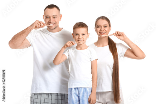 Happy family brushing teeth...