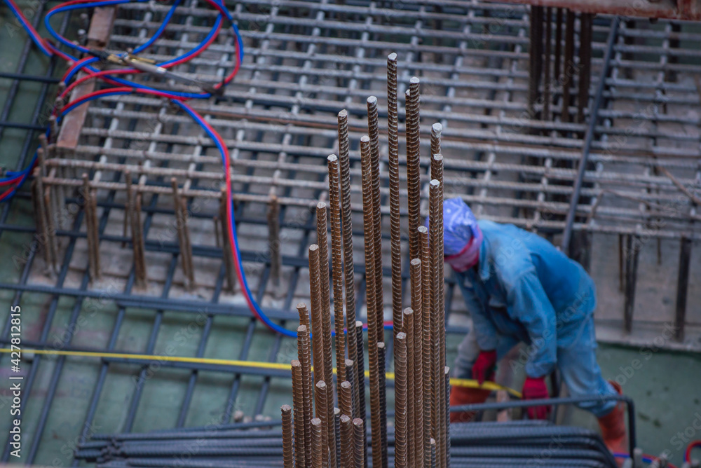 Reinforcement steel rod and deformed bar with rebar at construction site. Reinforcement steel rod and deformed bar with rebar at construction site.