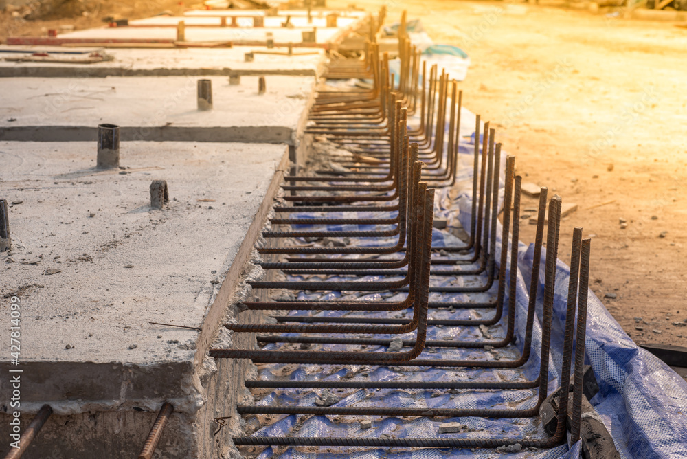 Obraz premium Reinforcement steel rod and deformed bar with rebar at construction site