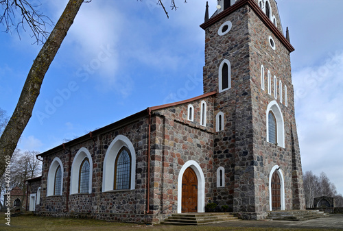 consecrated in 1926, the neo-Gothic Catholic church of Our Lady of Czestochowa and Saint Kazimierz in the village of Majewo Koscielne in Podlasie, Poland. General view of the temple photo