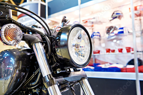Motorcycle headlight in sport shop