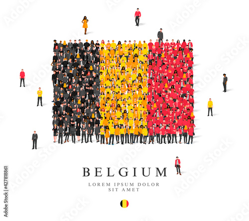 A large group of people are standing in black, yellow and red robes, symbolizing the flag of Belgium.