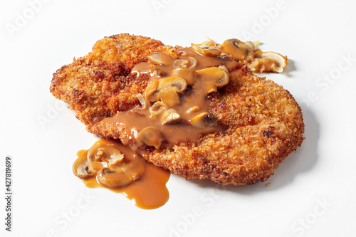 Meat schnitzel with chasseur sauce photo