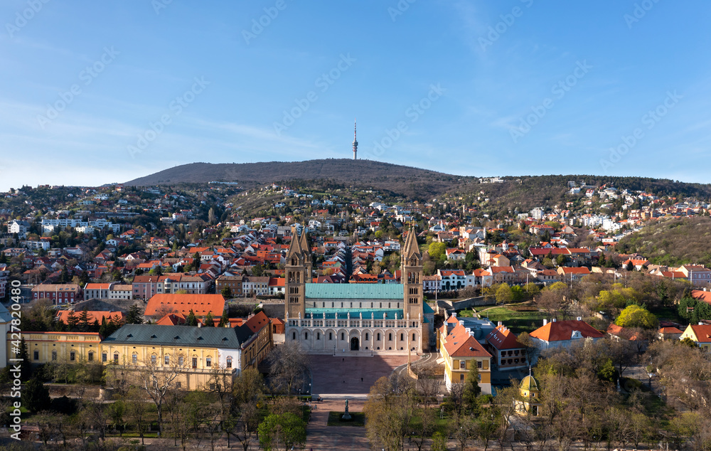 Amazing aerial cityscape about the Pecs city historical downtown and basilica in springtime. Unique medieval mood city in Hungary