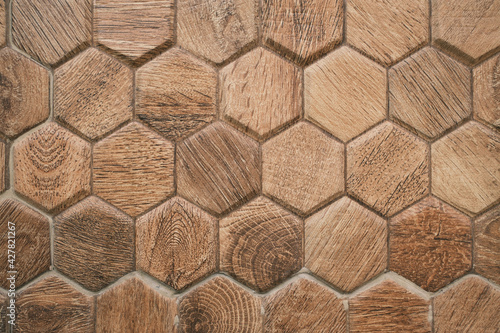 Brown wood texture background. Solid wood with a hexagonal pattern.