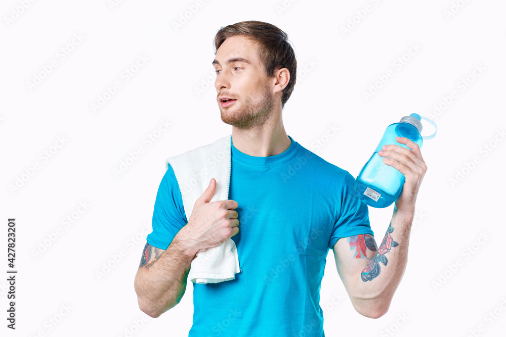 man in blue t-shirt water bottle workout health man in blue t-shirt water bottle workout health