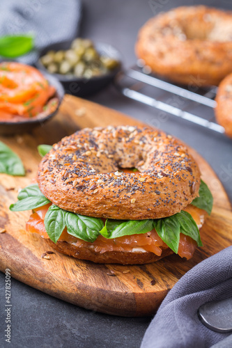 Bagels with cream cheese and salmon. Plating, fast lunch, meal.  photo