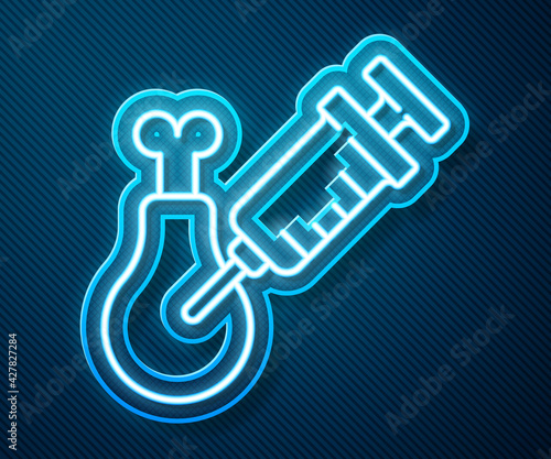 Glowing neon line Gmo research chicken icon isolated on blue background. Syringe being injected to chicken. Vector