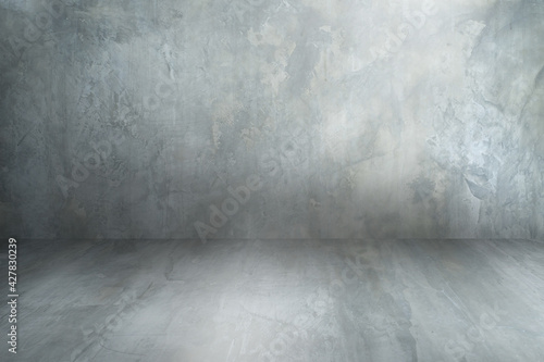 Background  floor  studio. Room empty of cement floor. Gray room cement or concrete wall texture background and sun light.