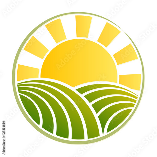 The wheat field symbol with bright sun.