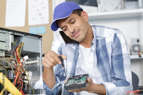 male technician during smartphone repair