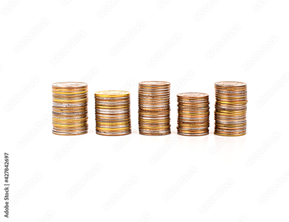 Row of metal coins isolated on white background. Investments, deposits, profits. Copy space. Row of metal coins isolated on white background. Investments, deposits, profits. Copy space.