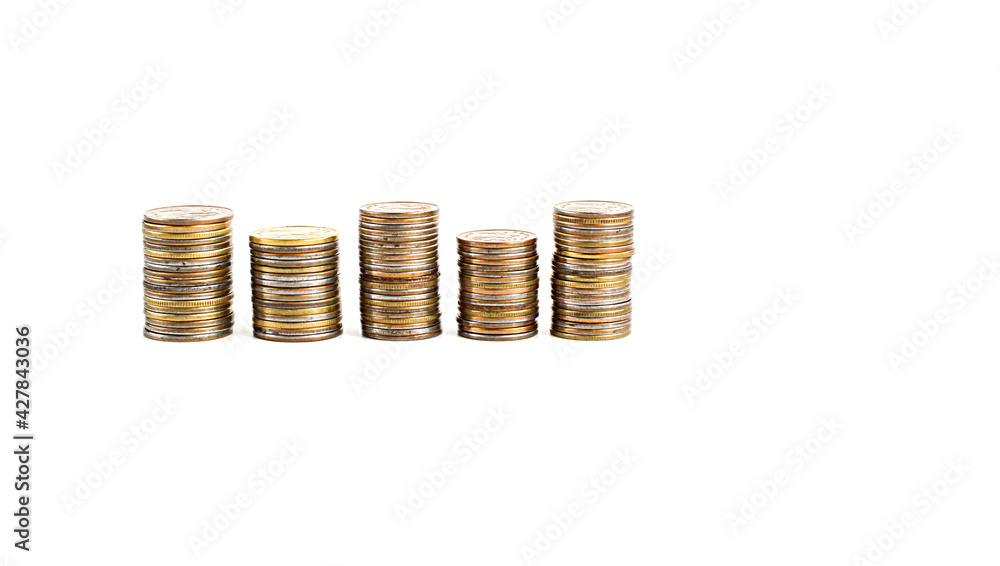 Money coins in a stack, stand exactly in a row, isolated on a white background. Copy space for text. Money coins in a stack, stand exactly in a row, isolated on a white background. Copy space for text.