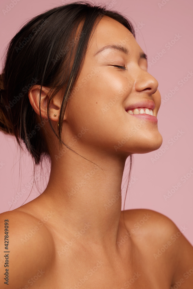 Obraz premium Happy young asian model with perfect skin