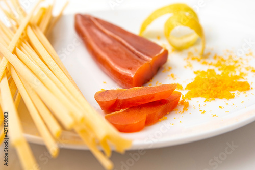 Deliziosa bottarga di muggine e pasta, Cucina tipica sarda, Cibo Italiano  photo