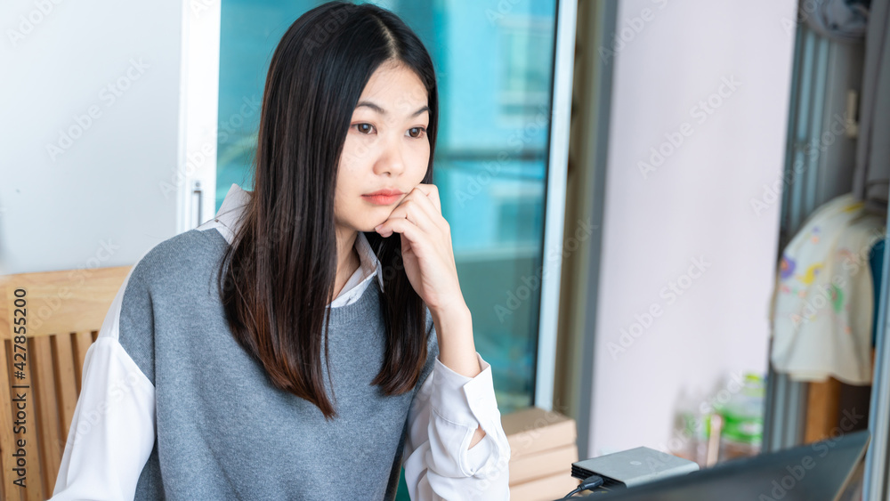 Young pretty asian business woman with notebook Young pretty asian business woman with notebook