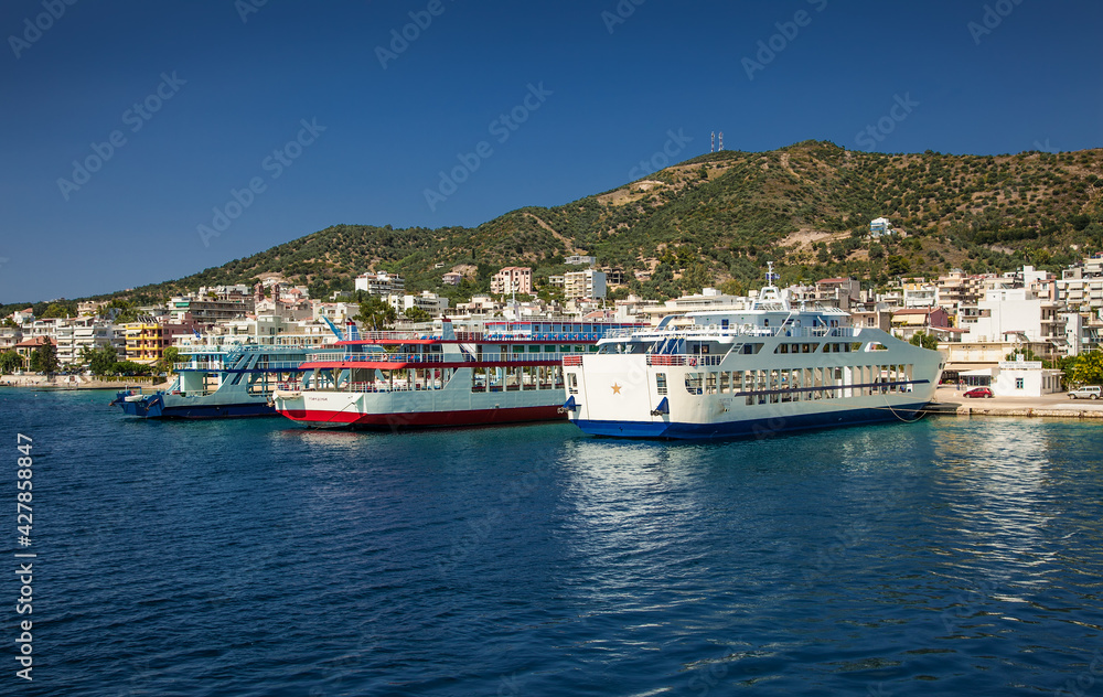 Ferryboats on the dock in Lutra Edipsou (Aidipsos), Evia , Greece.