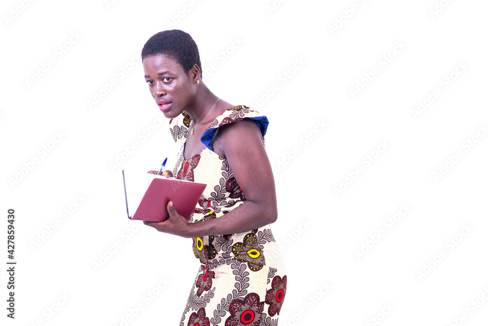 close up of a beautiful young businesswoman holding diary close up of a beautiful young businesswoman holding diary