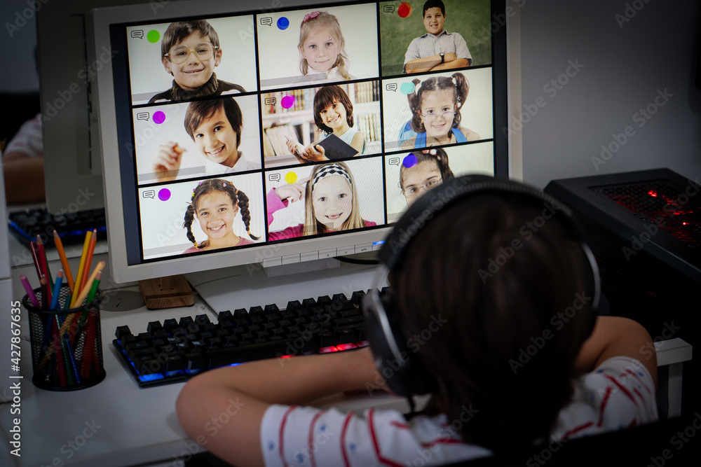 Little boy having online school distance learning class Little boy having online school distance learning class