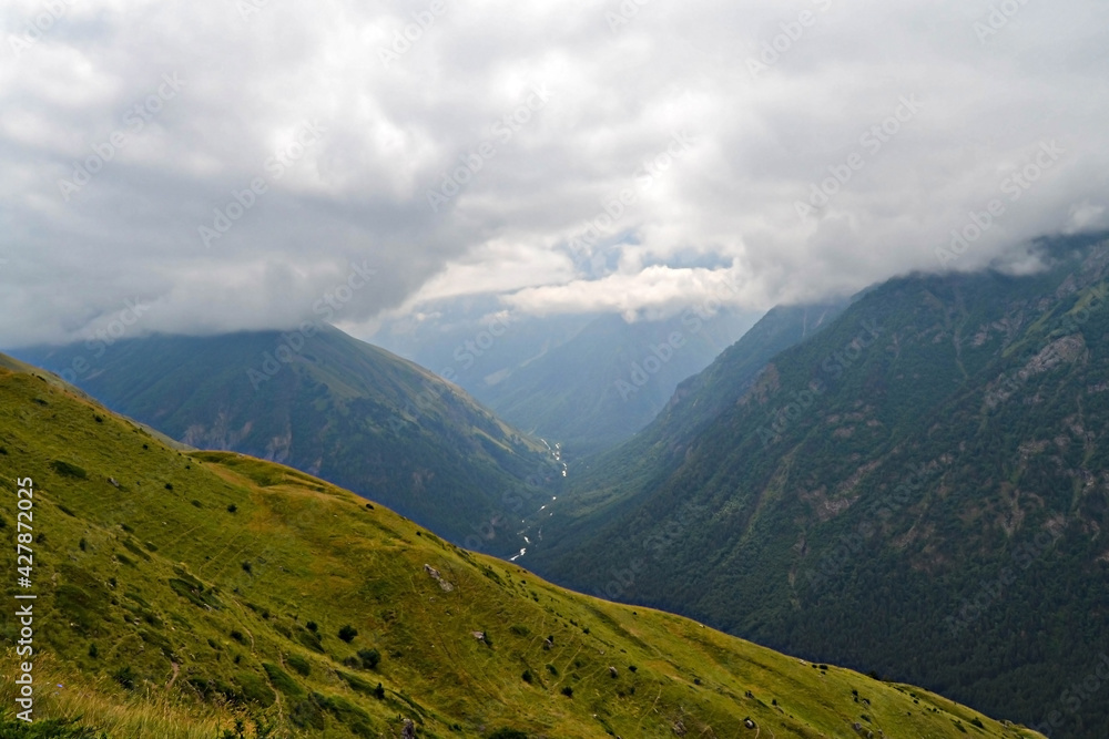 Landscape with clouds in the majestic mountains of the Caucasus.
  Kabardino-Balkaria. Tegenekli.